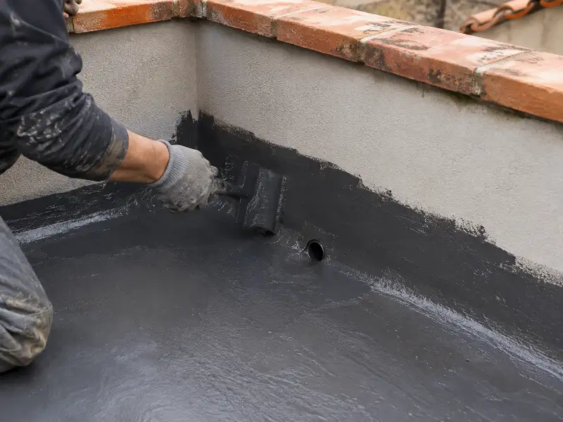Application d'un traitement de protection sur une terrasse propre